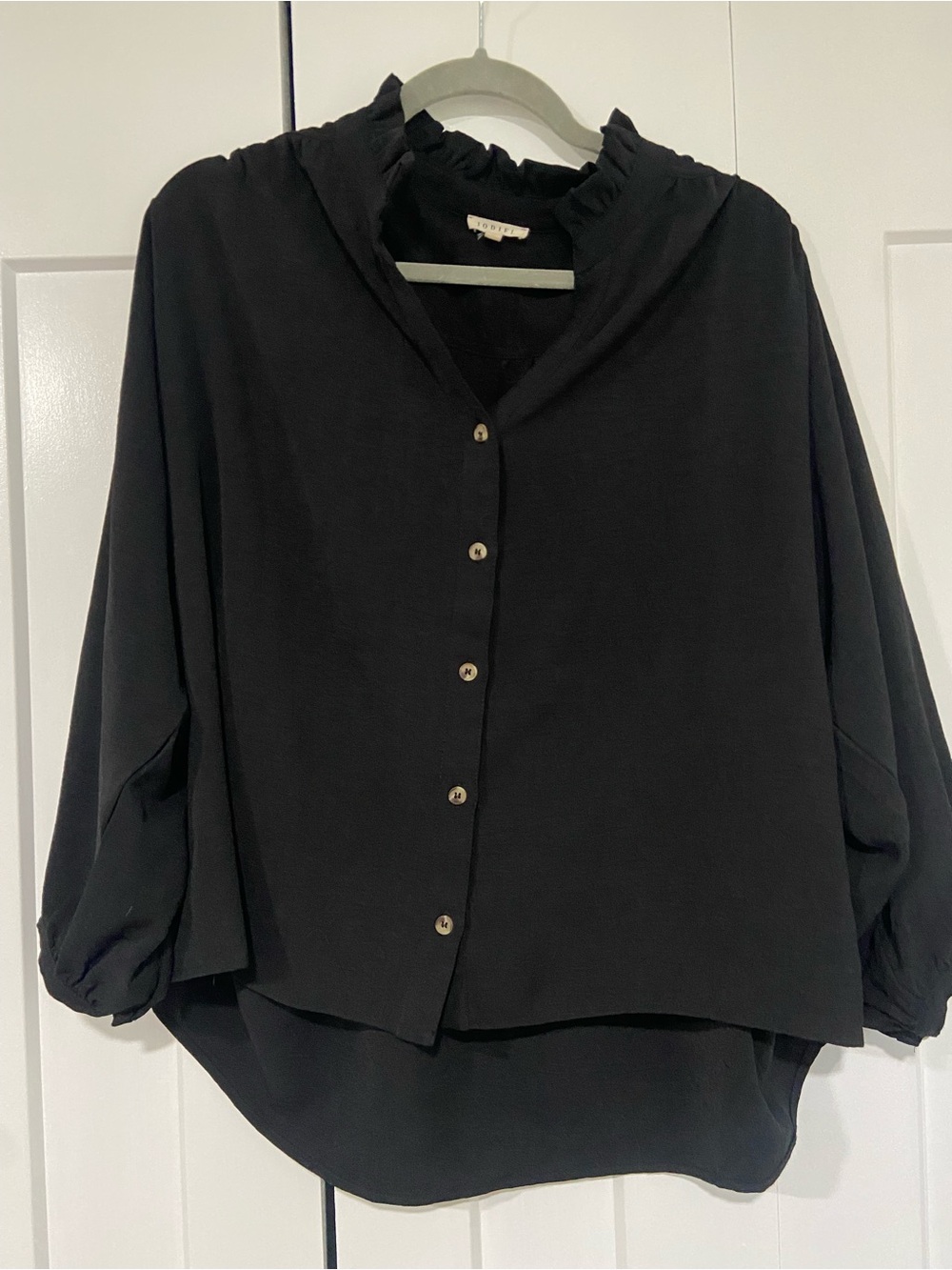 JODIFL Black Button-Front Ruffle Collar Blouse